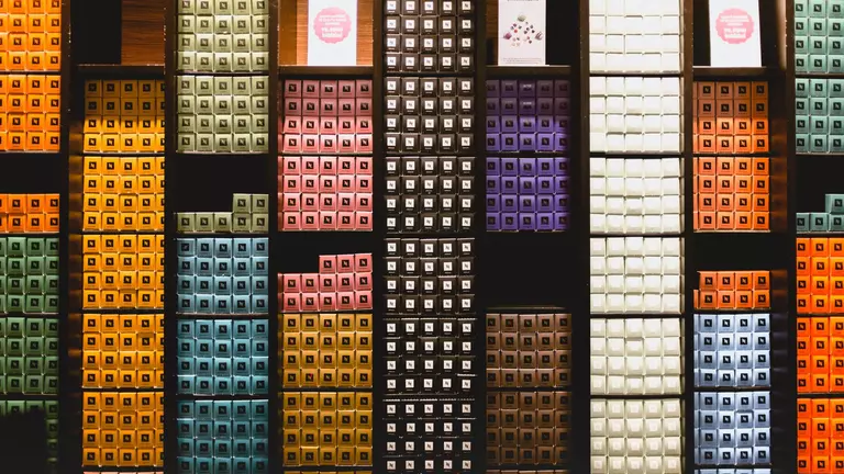 Shelves filled with Nespresso coffee pods